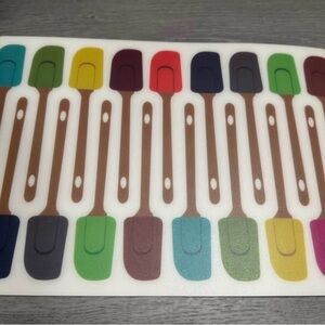 Joseph Joseph silicon cutting board colorful spatula design